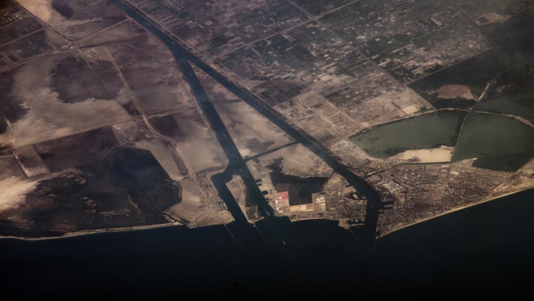 Orbital astronaut and satellite photography of Suez Canal.