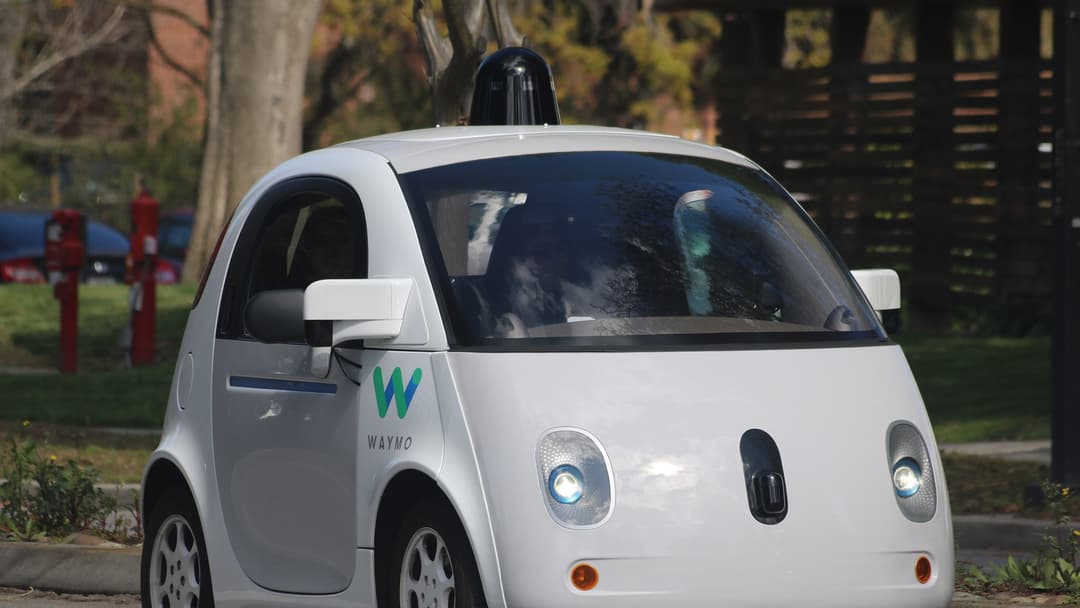 Waymo autonomous self-driving vehicle equipped with rooftop LiDAR and radar sensors