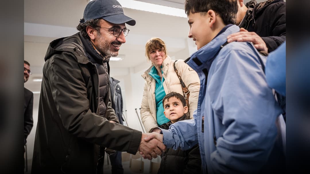 Hamdi Ulukaya speaking at a global business leadership forum.