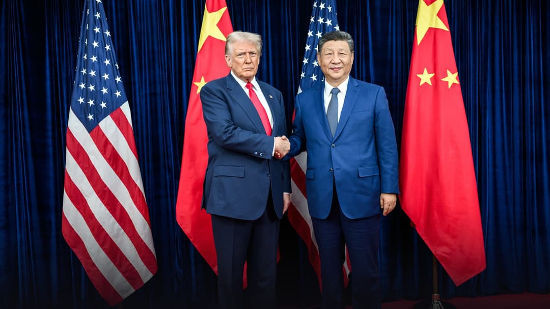 Donald Trump and Xi Jinping walking together at an official state welcome ceremony alongside a summit handshake.