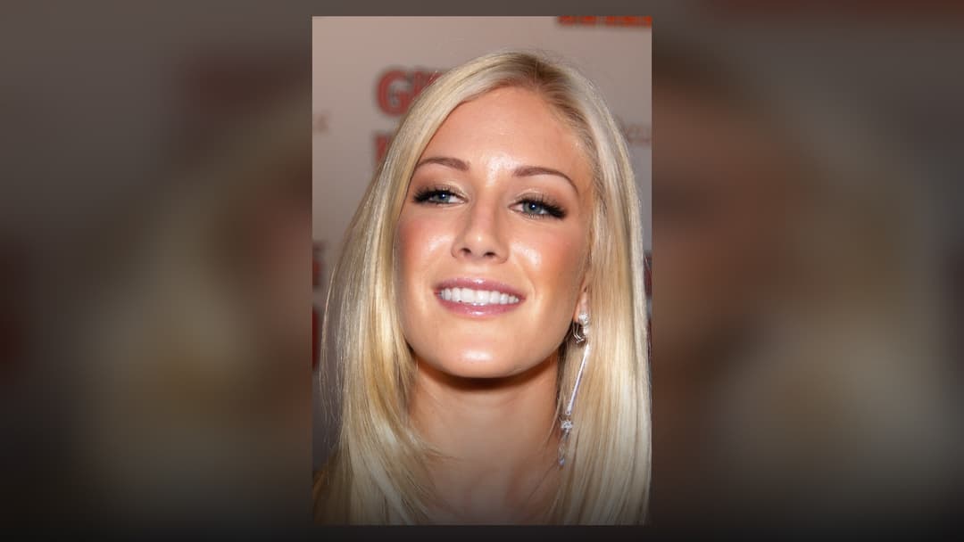 Heidi Montag smiling at a red carpet event in Los Angeles