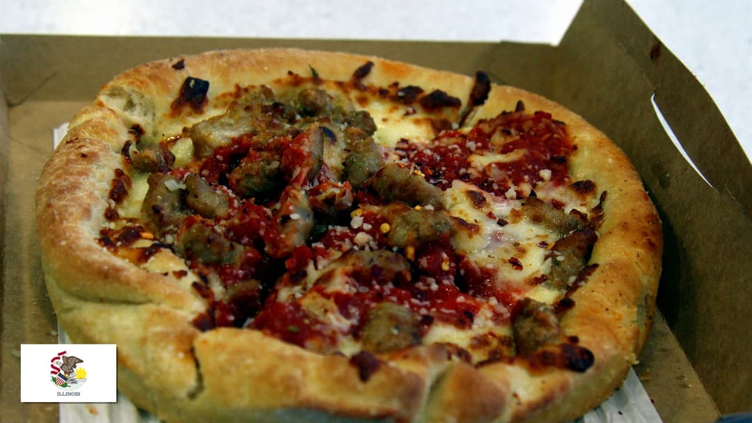 Thick slice of Chicago deep-dish pizza with cheese pull and rich tomato sauce with Illinois flag overlay in bottom-left corner