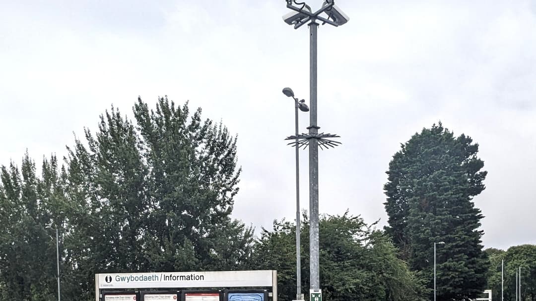 High-resolution close-up of an outdoor municipal CCTV surveillance camera dome.