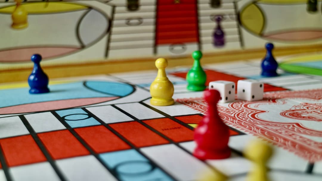 Classic wooden board game setup with dice and pieces