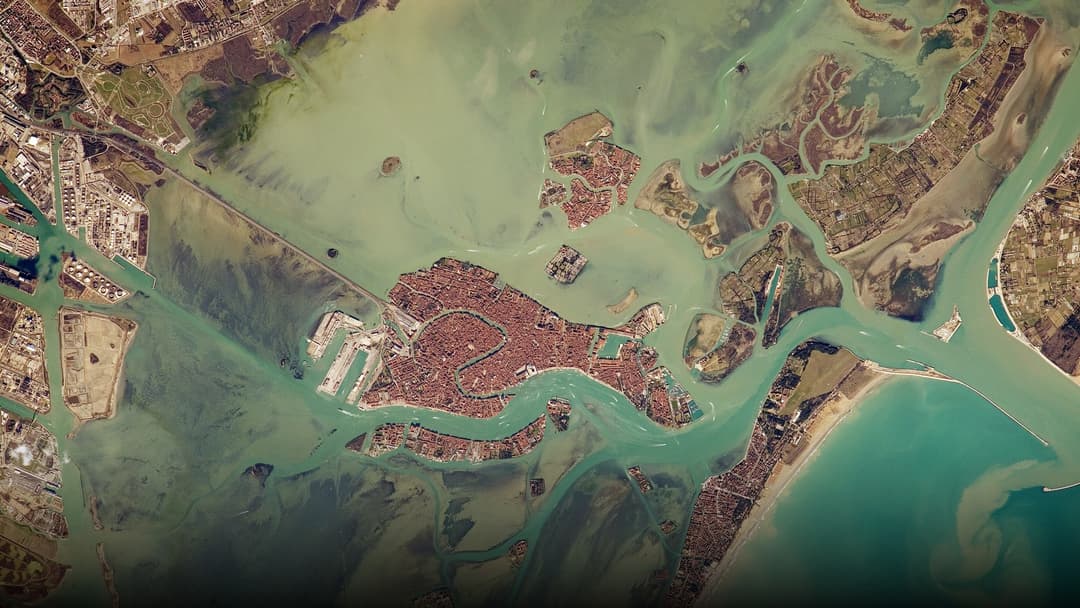 Orbital astronaut and satellite photography of Venice Lagoon & Sea Barriers.