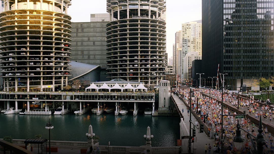 The Chicago River reflecting the architectural twin corn-cob towers of Marina City.