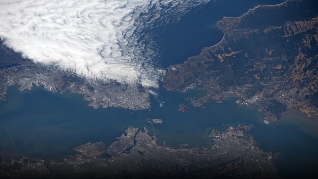 Orbital astronaut and satellite photography of San Francisco Bay & Bridges.