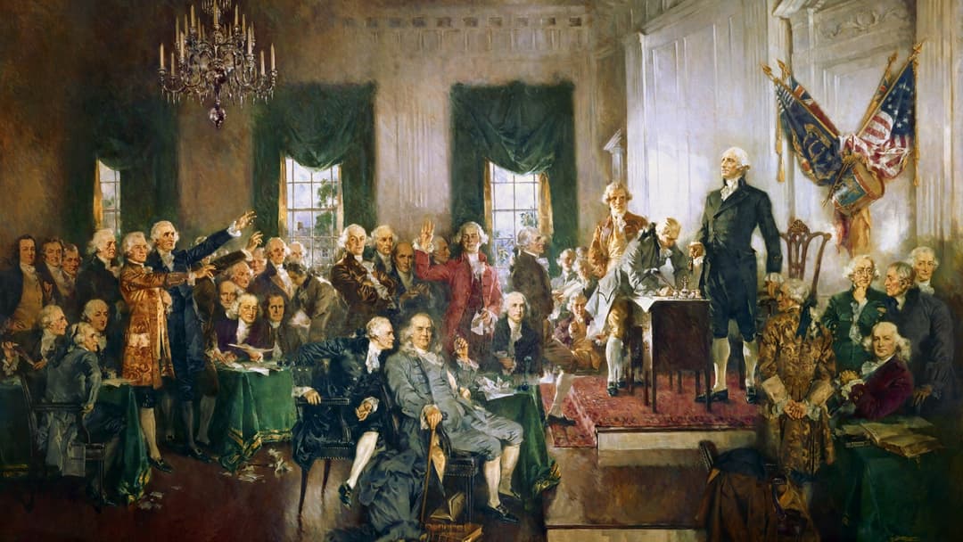 Howard Chandler Christy's painting of James Madison and the delegates signing the US Constitution in Philadelphia.