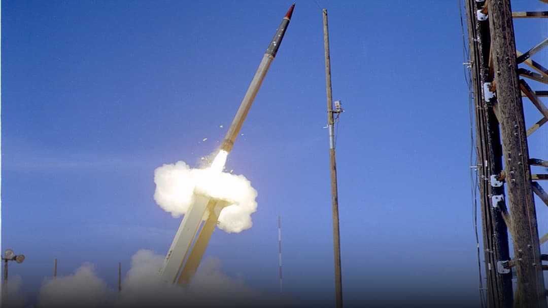 THAAD interceptor missile launching from mobile transporter during test