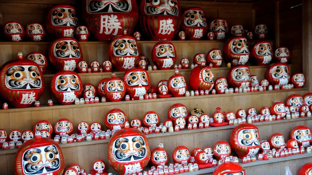 9. Japan (Painting The Left Eye Of A Red Daruma Doll Upon Victory)