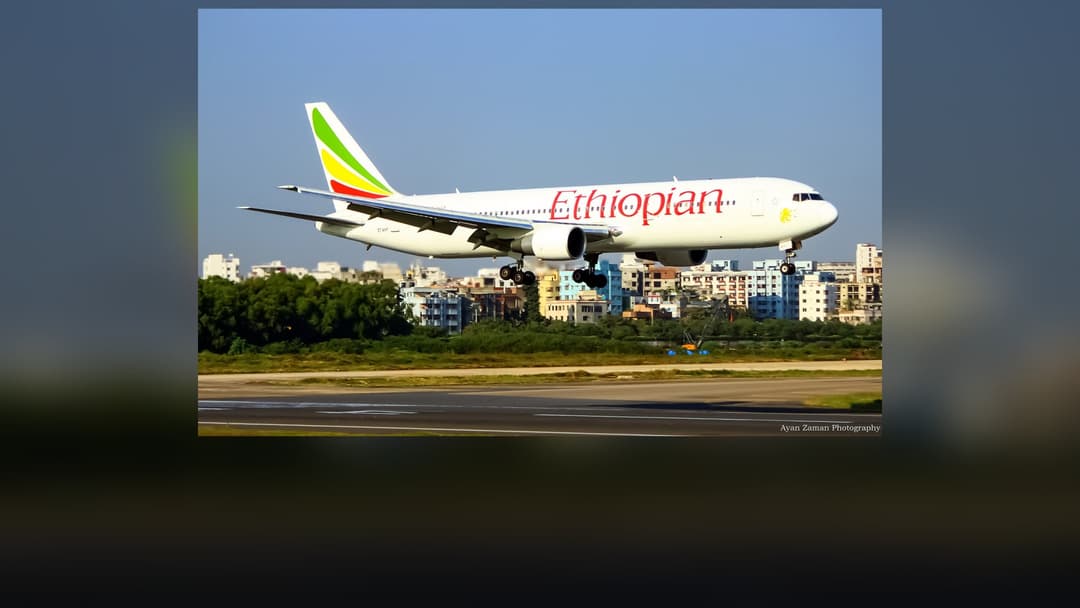 Ethiopian Airlines Boeing 767 wide-body aircraft on the tarmac in official green, yellow, and red tail livery.