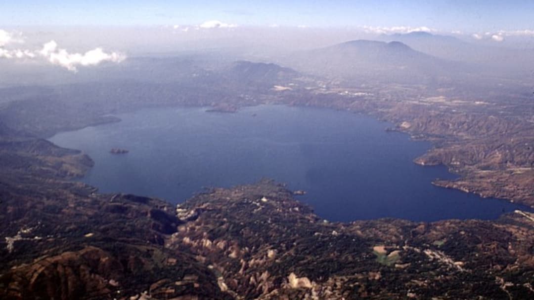 Aerial view of the flooded Lake Ilopango volcanic caldera in El Salvador.