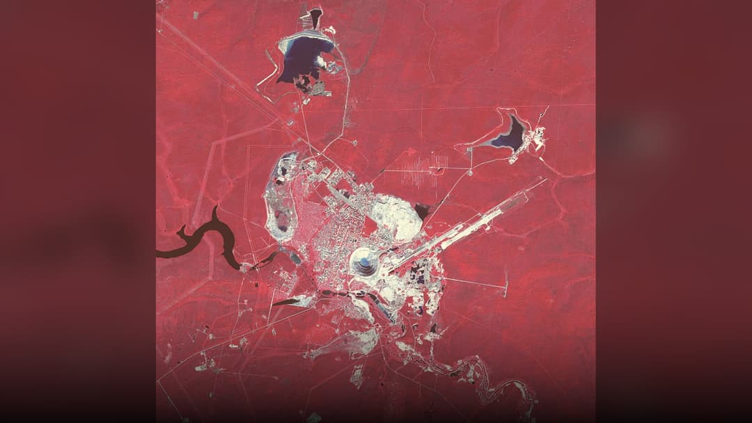 Orbital astronaut and satellite photography of Mirny Diamond Mine.