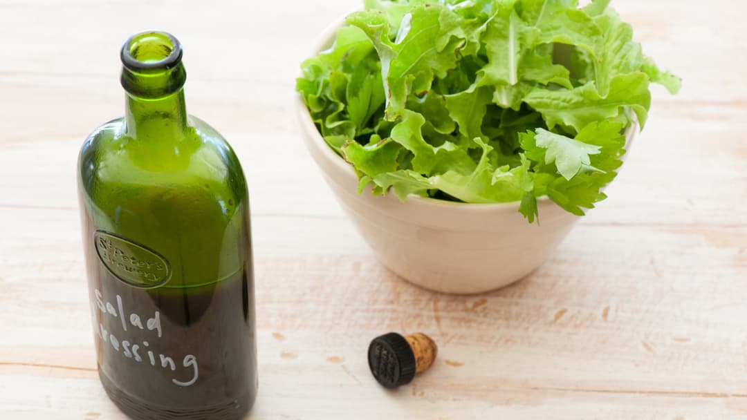 Bottles of commercial salad dressing on shelf