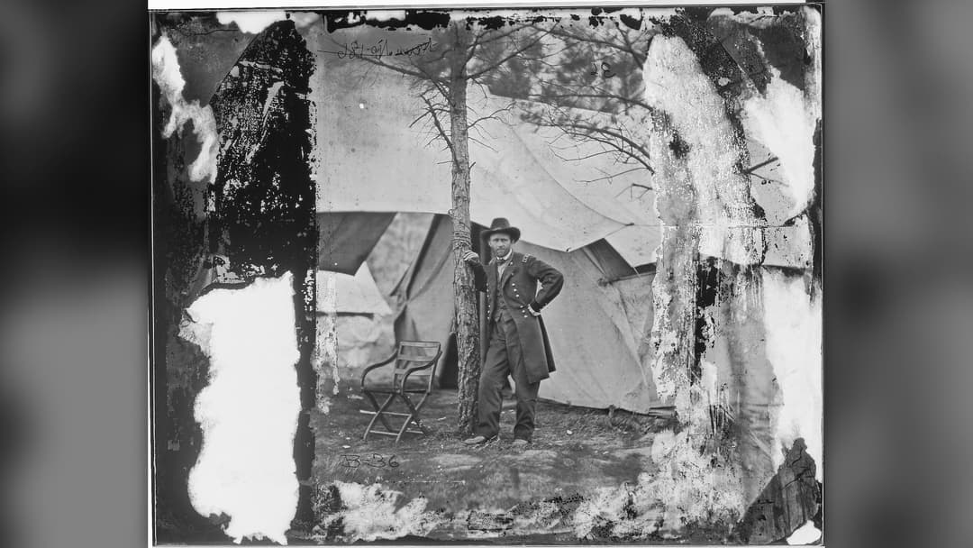 Lieutenant General Ulysses S. Grant standing outside his headquarters tent at Cold Harbor, Virginia, in June 1864.