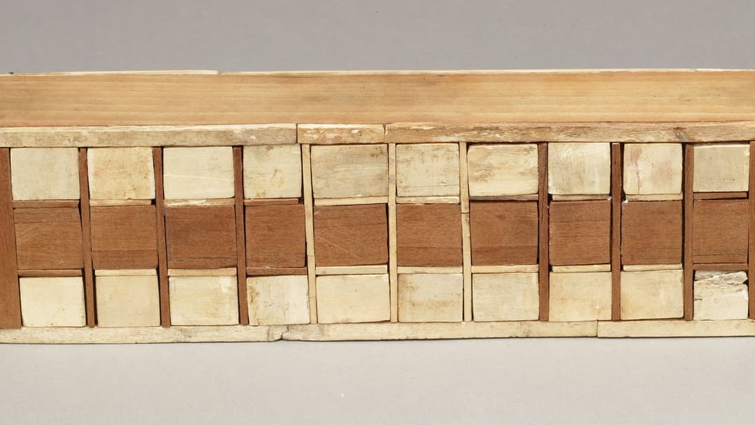 Ancient Egyptian royal Senet game box with carved drawers and gaming squares