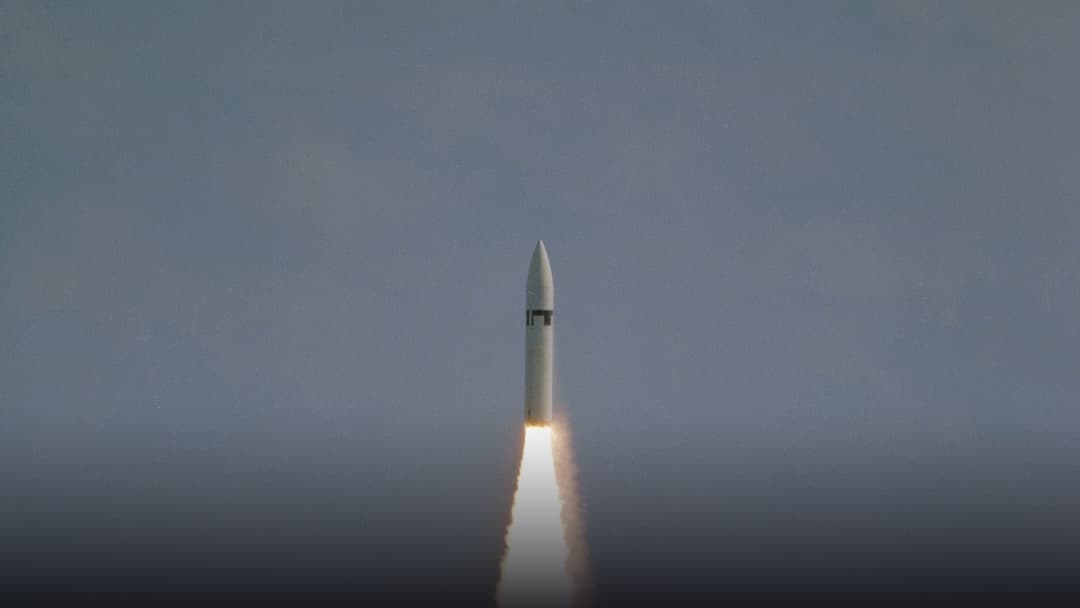 A U.S. Navy Polaris ballistic missile breaking through the ocean surface during an underwater launch test.