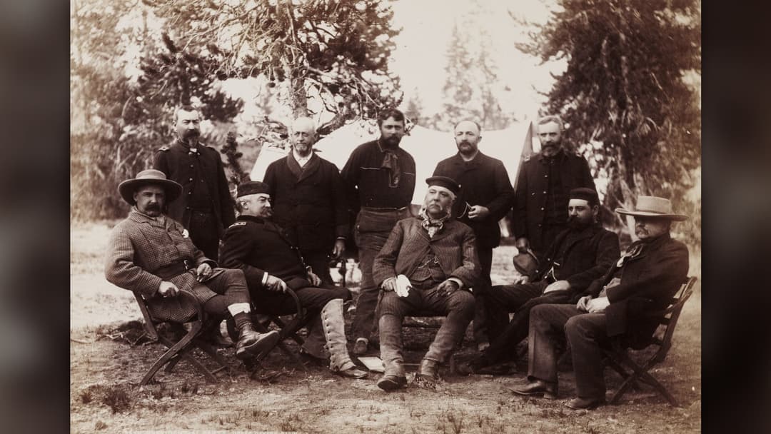 1883 photograph of President Chester A. Arthur seated with military officers during his Yellowstone National Park expedition.