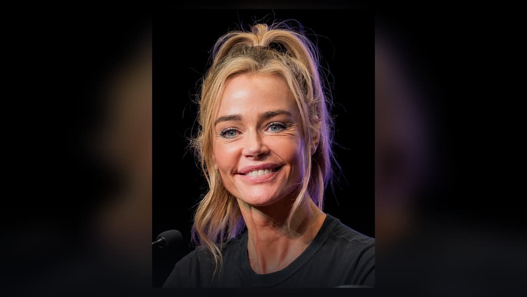 Denise Richards greeting fans at a public appearance