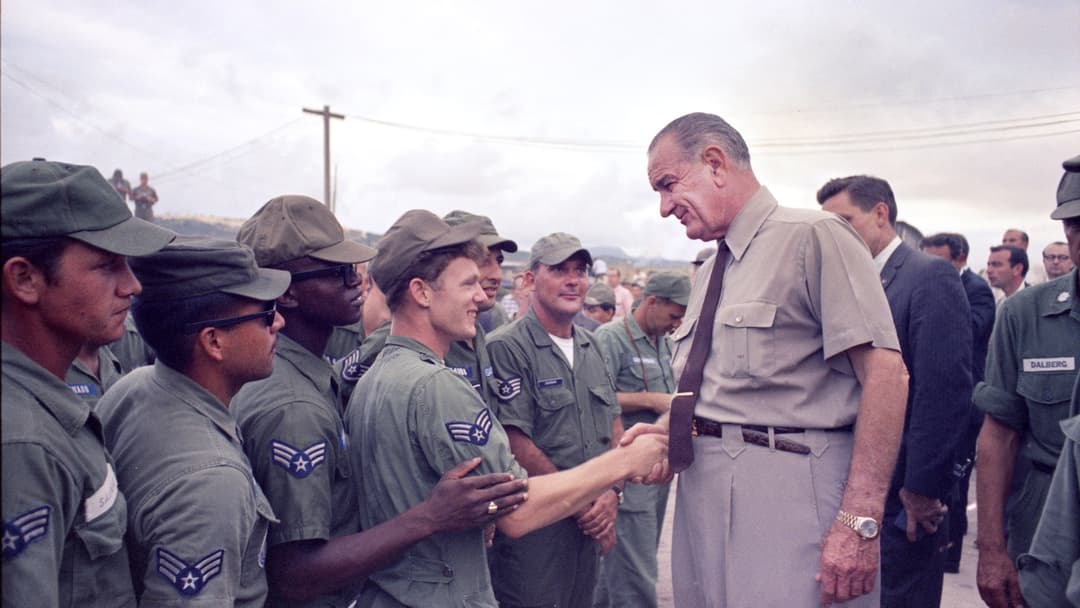 President Lyndon B. Johnson shaking hands with US military personnel at Cam Ranh Bay in October 1966.