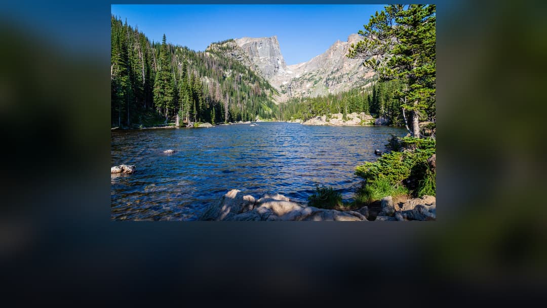 Panoramic landscape vista of Rocky Mountain National Park showing natural geological formations, terrain, and wilderness.
