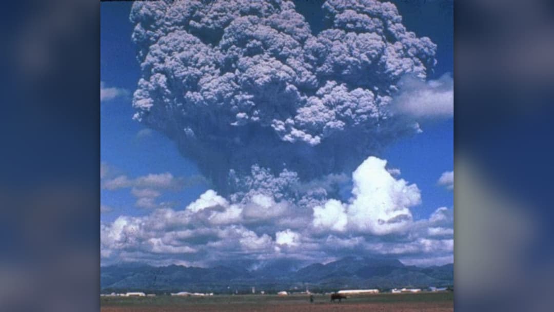 Mushroom-shaped ash cloud rising high above Mount Pinatubo in the Philippines in June 1991.