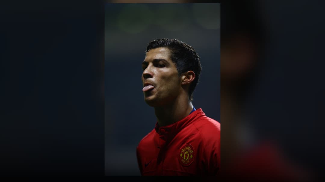 Young Cristiano Ronaldo during European match action for Manchester United.