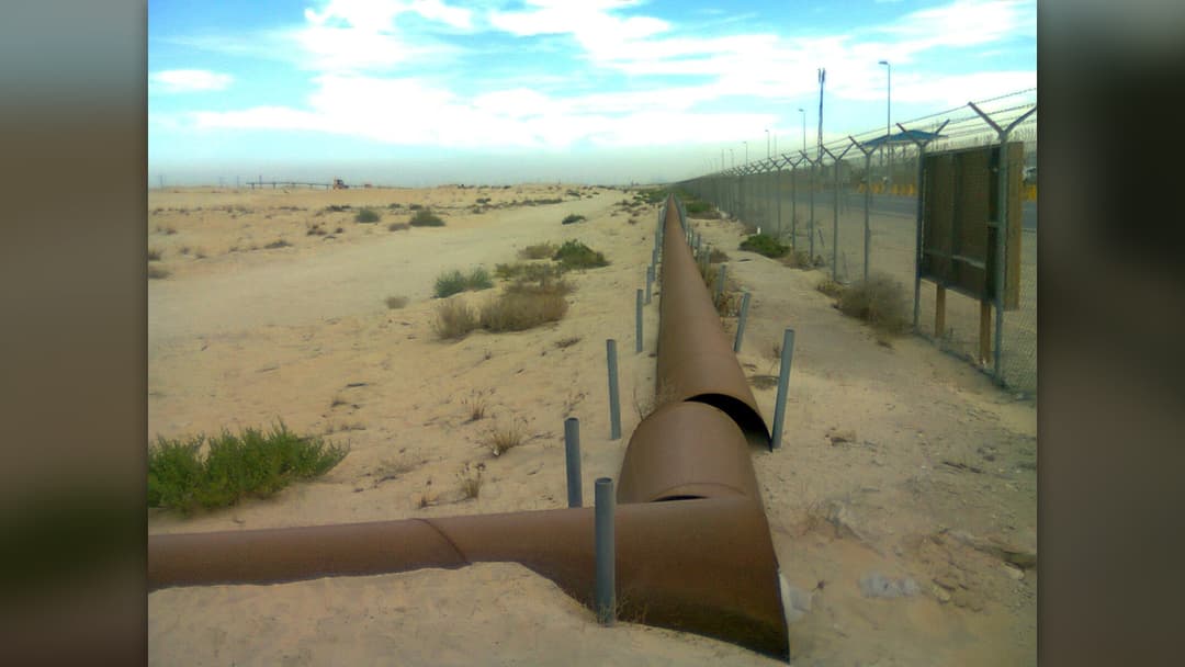 Overland crude oil pipelines running across the Jubail desert in Saudi Arabia.