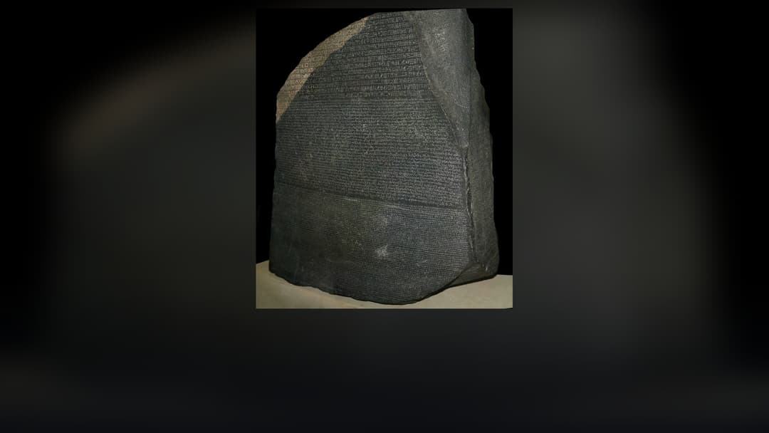 The Rosetta Stone granodiorite stele inscribed in three scripts at the British Museum.