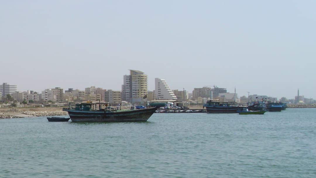 Vessels navigating the waterway between Qeshm Island and the port city of Bandar Abbas in Iran.