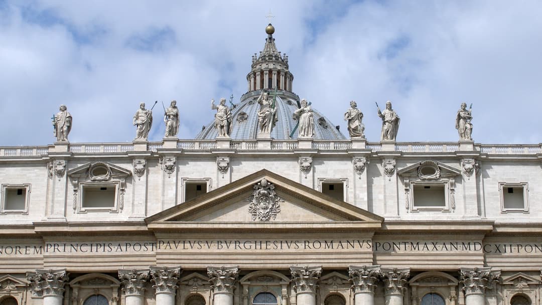 Facade and dome of St. Peter's Basilica in Vatican City