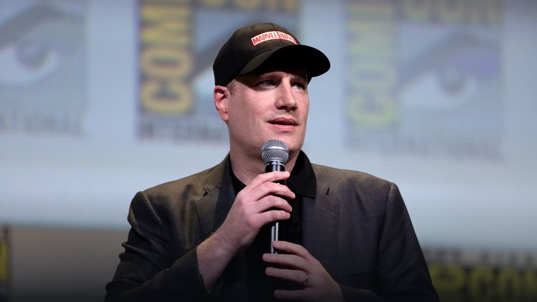 Marvel Studios President Kevin Feige speaking on stage at San Diego Comic-Con.
