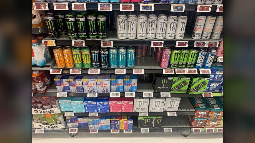 Retail shelf display of energy drink cans