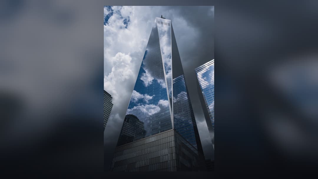 One World Trade Center soaring with its dramatic spire above Lower Manhattan.