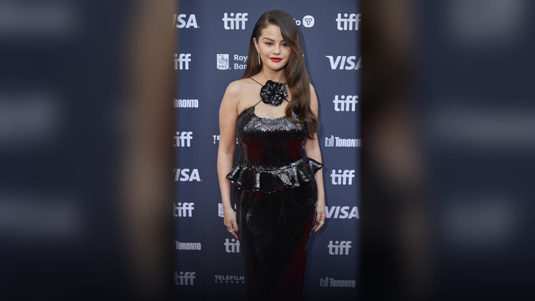 Actress and entrepreneur Selena Gomez posing gracefully on the red carpet at the 2024 Toronto International Film Festival.
