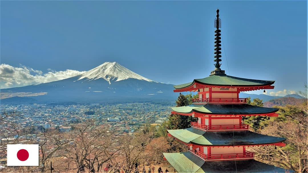 Chureito Pagoda and Mount Fuji in Japan with the Japanese flag in the bottom left corner
