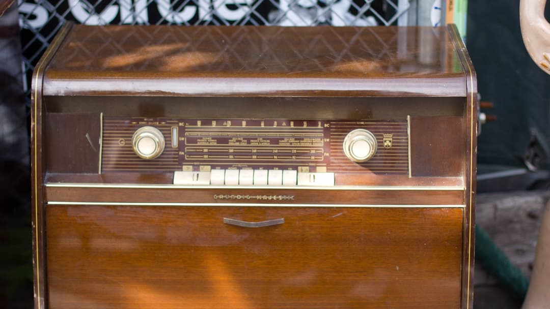 14. Playing Vinyl LP Records On Wooden Console Hi-Fis