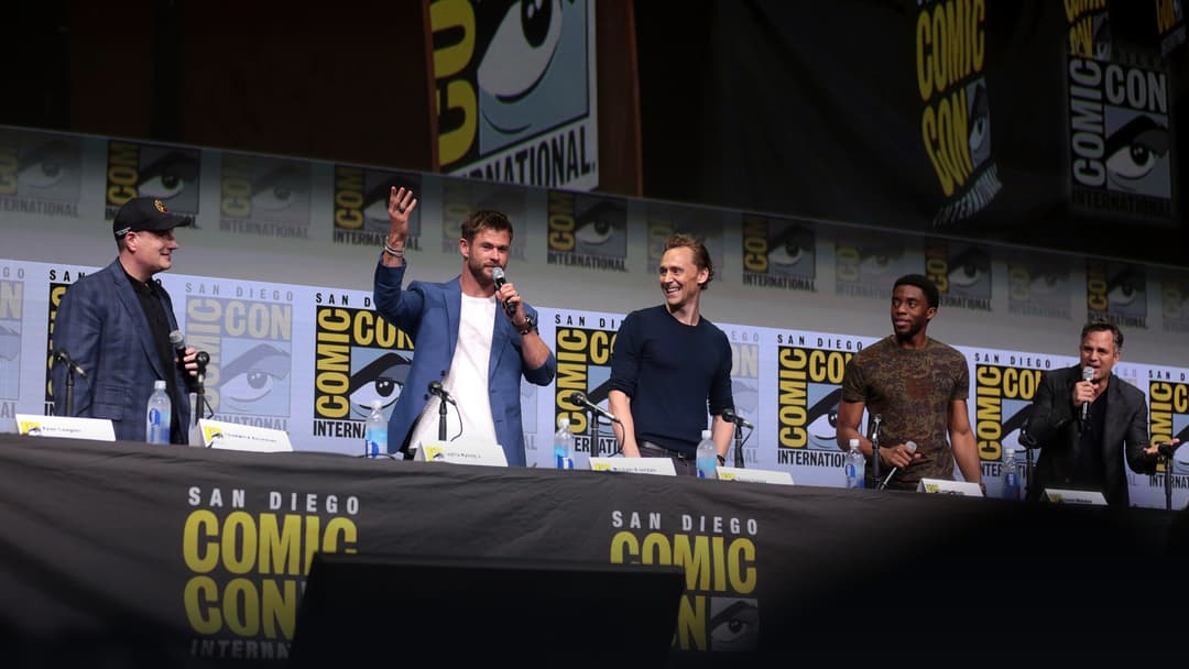 Marvel Studios ensemble cast assembled together on stage.