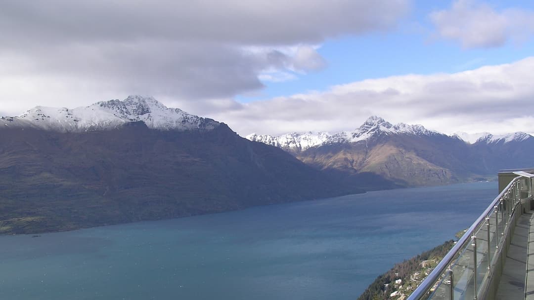 Panoramic skyline view of Lake Wakatipu and the Remarkables mountain range from the Skyline Gondola in Queenstown.